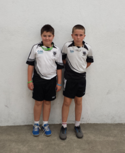 Ben Keeling and Conor Dobbs playing in the U11 competition