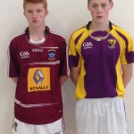Keith Armstrong with Westmeath opponent