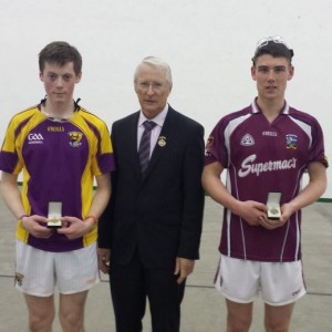Keith Armstrong, Wexford and Jamie Kelly, Galway with GAA Handball President, Willie Roche