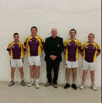 Paul Lambert completed a Leinster junior double at Coolgreany last night when he teamed with Paddy Houghton to defeat David Kenny and Niall Maher 21-10, 21-16 in an all Wexford doubles final. Lambert had already retained his singles title by beating Stephen Quinn, Meath They are pictured with Leinster GAA Handball Vice Chairman, Tony Breen