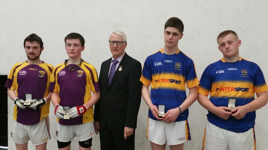 Liam and Laurence with their Tipperary opponents and GAA Handball President, Willie Roche