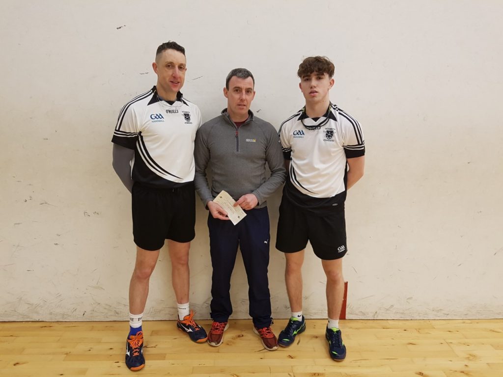 Gavin Buggy and Daniel Kavanagh with referee Tommy Hynes before the toss up for serve.