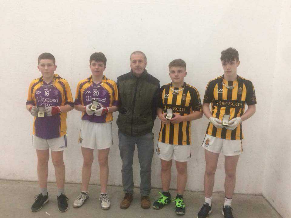 Conor Dobbs and Mark Doyle with their Monaghan opponents